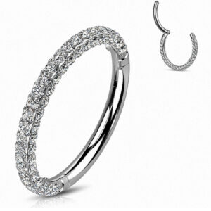 Piercing argolla de titanio ASTM F136 con zirconias Swarovski® engarzadas en tres lados y sistema Clicker.